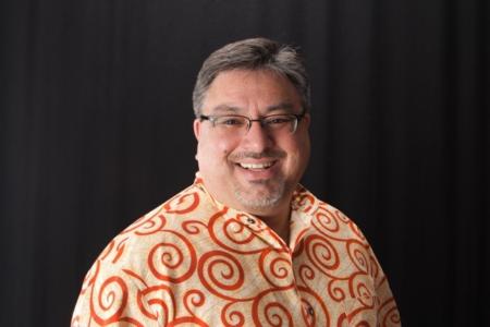 A headshot photo of CAMRIS Program and Operational Manager Malik Jaffer